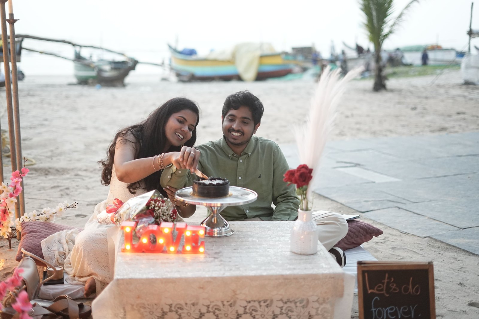Celebrating together at a table by the beach